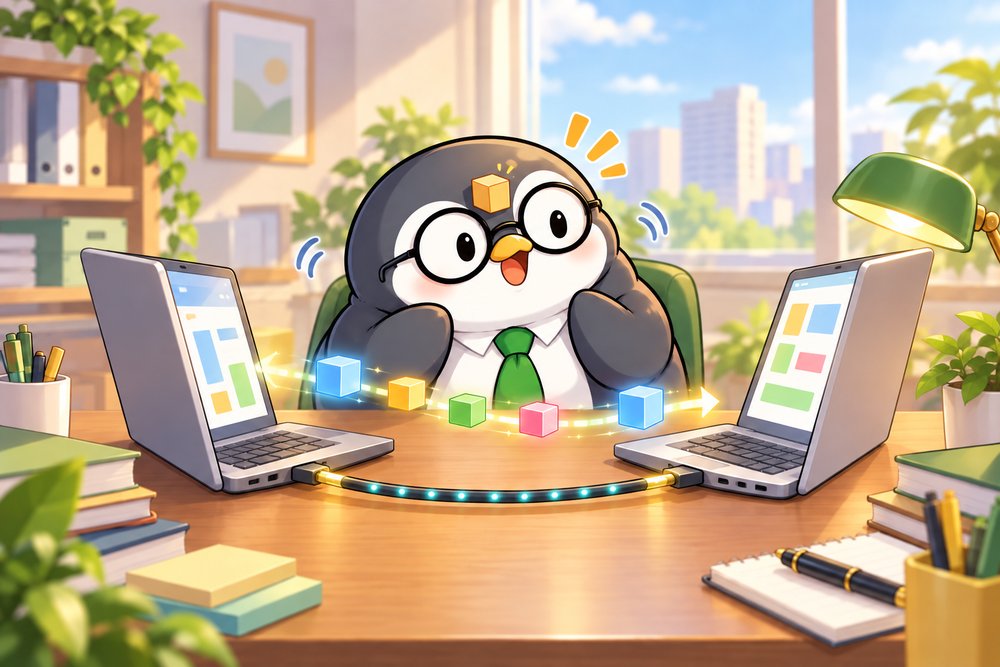 2台のPCの間でデータの引っ越しを見守るペンギンのナビ助